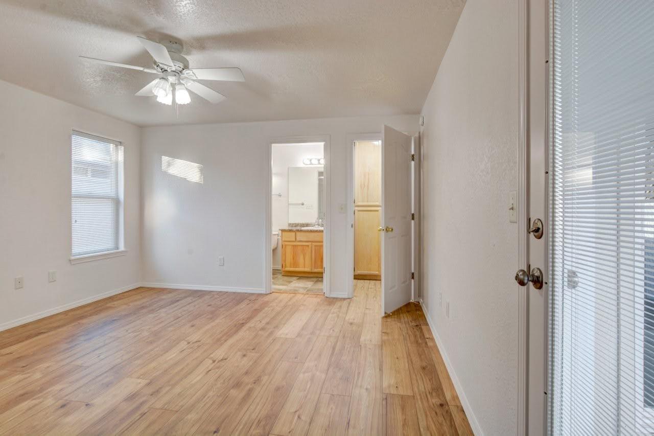 417 Crystal Drive Eagle Point, OR 97524 - Photo 18 of 35 wooden floor in an empty room with a window