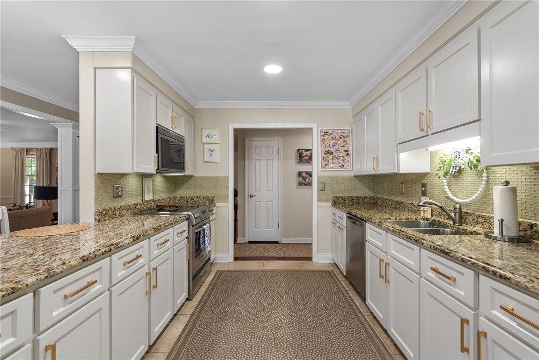 3513 Hopewell Road Anderson, SC 29621 - Photo 27 of 50 Culinary delights await in this bright kitchen with ample counter space and modern appliances.