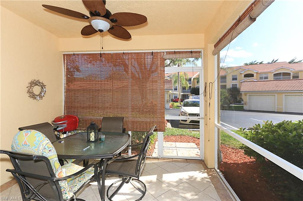 4670 St Croix Lane, Unit 618 Naples, FL 34109 - Photo 15 of 19 a view of a dining room with furniture window and outside view