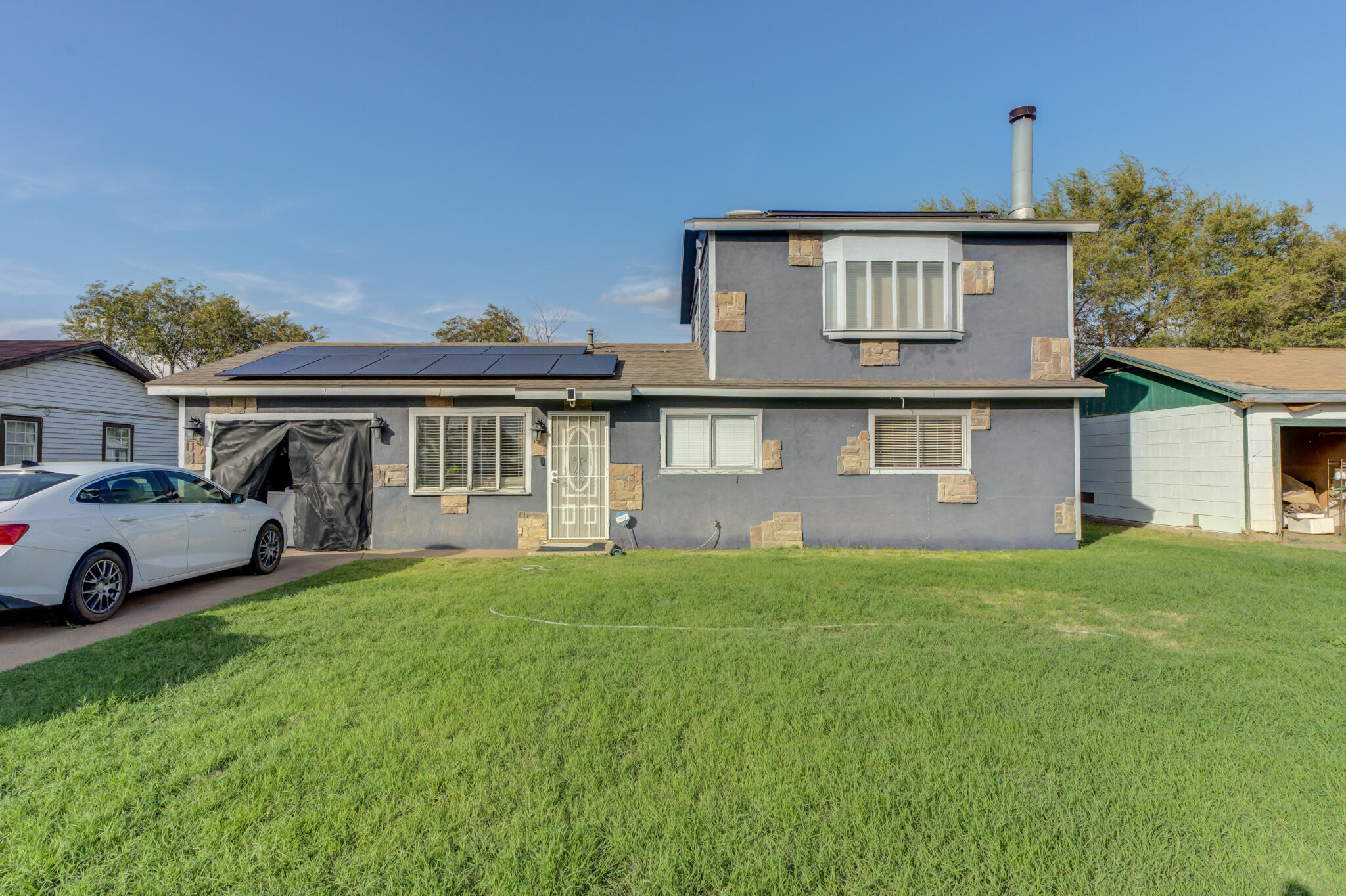 2901 Beech Avenue Lubbock, TX 79404 - Photo 1 of 26 a view of house with a garden