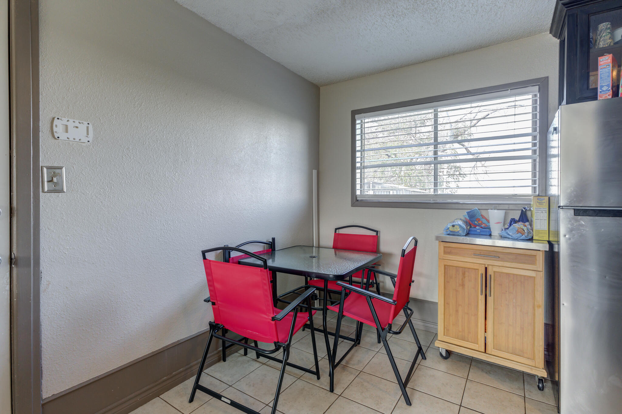 2901 Beech Avenue Lubbock, TX 79404 - Photo 15 of 26 a view of a dining room with furniture and a window