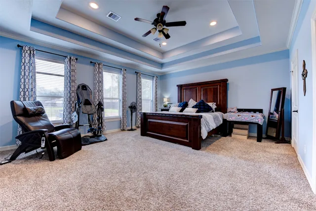 a room with furniture and a chandelier