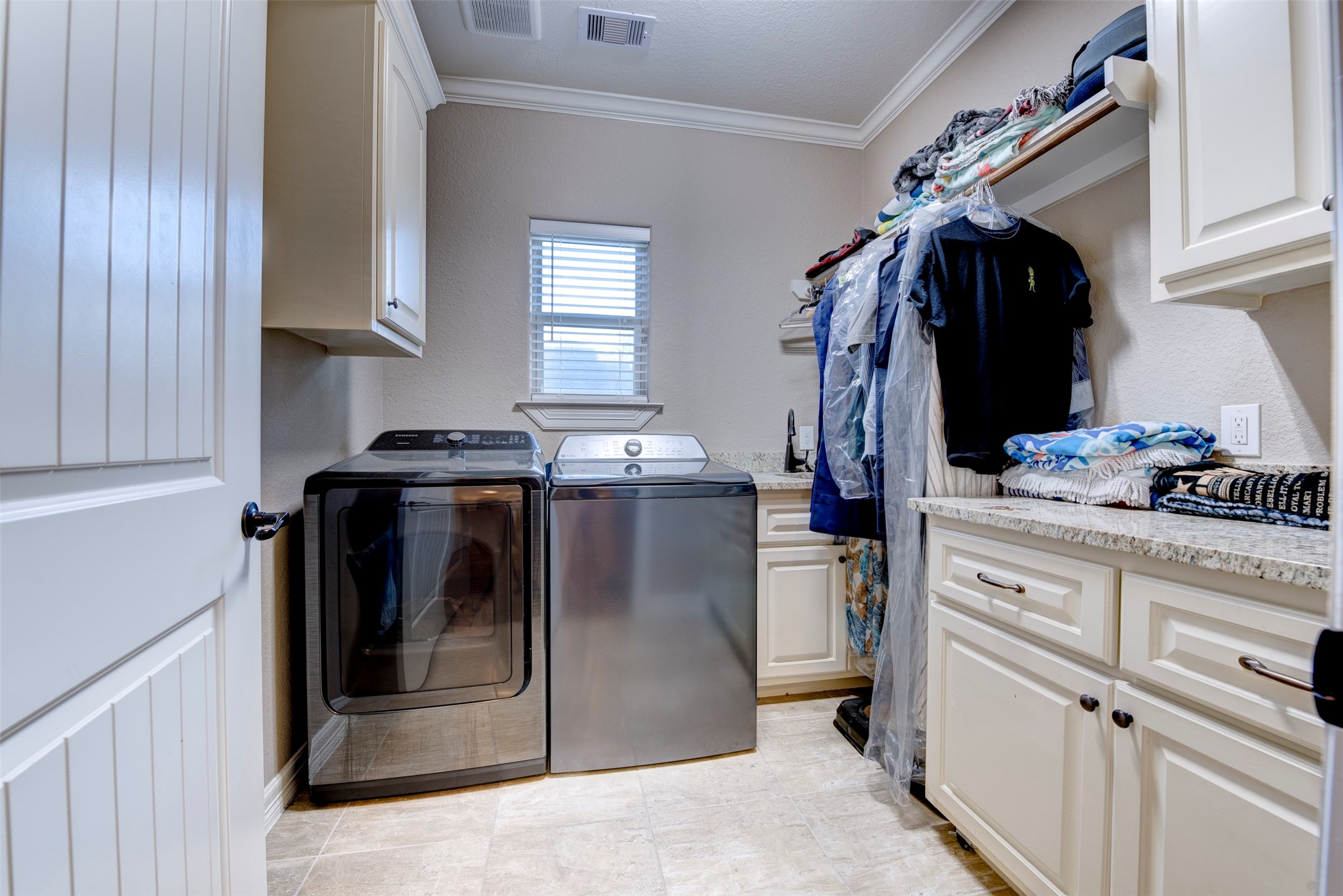 27635 Rio Blanco Drive Splendora, TX 77372 - Photo 35 of 46 a kitchen with stainless steel appliances granite countertop a refrigerator and a stove