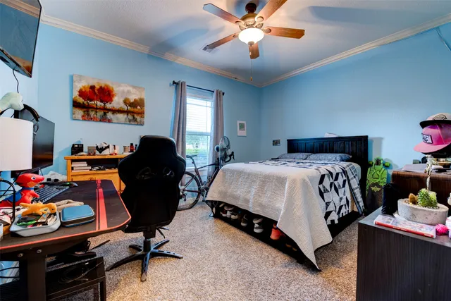 a bathroom with a granite countertop sink toilet and mirror