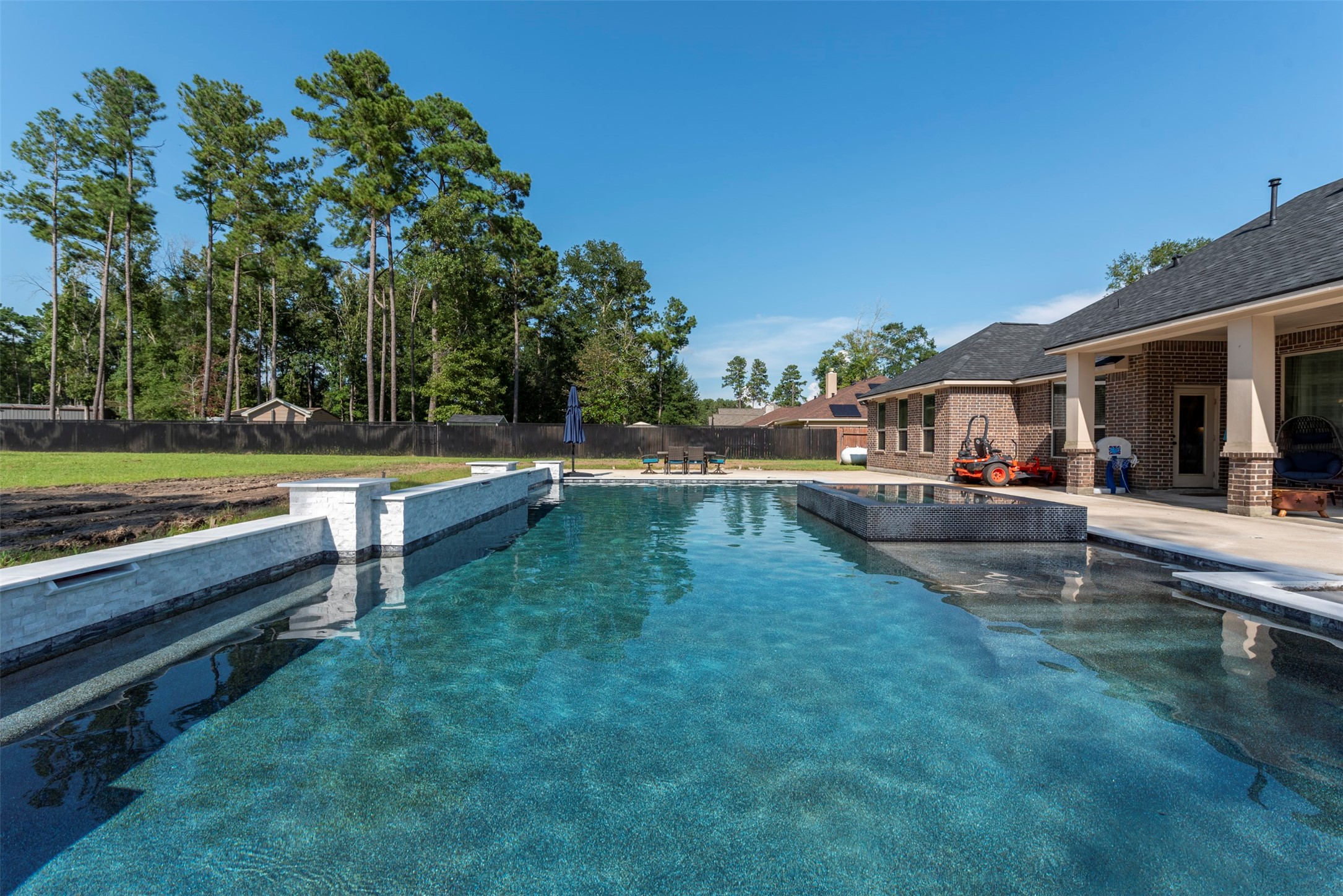 27635 Rio Blanco Drive Splendora, TX 77372 - Photo 42 of 46 a view of a house with a yard and sitting area