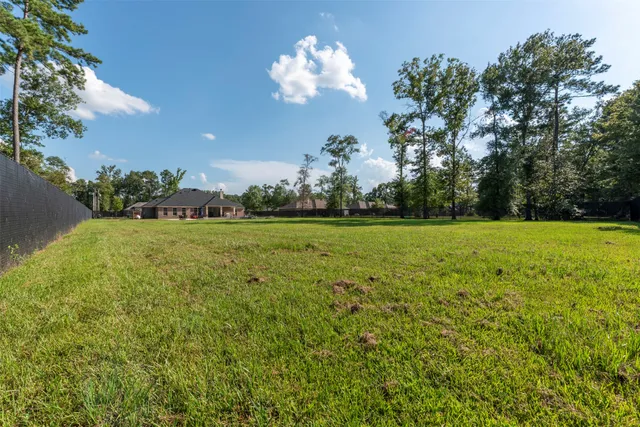 a view of a golf course with a lake