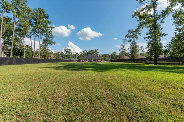 a view of a golf course with a lake