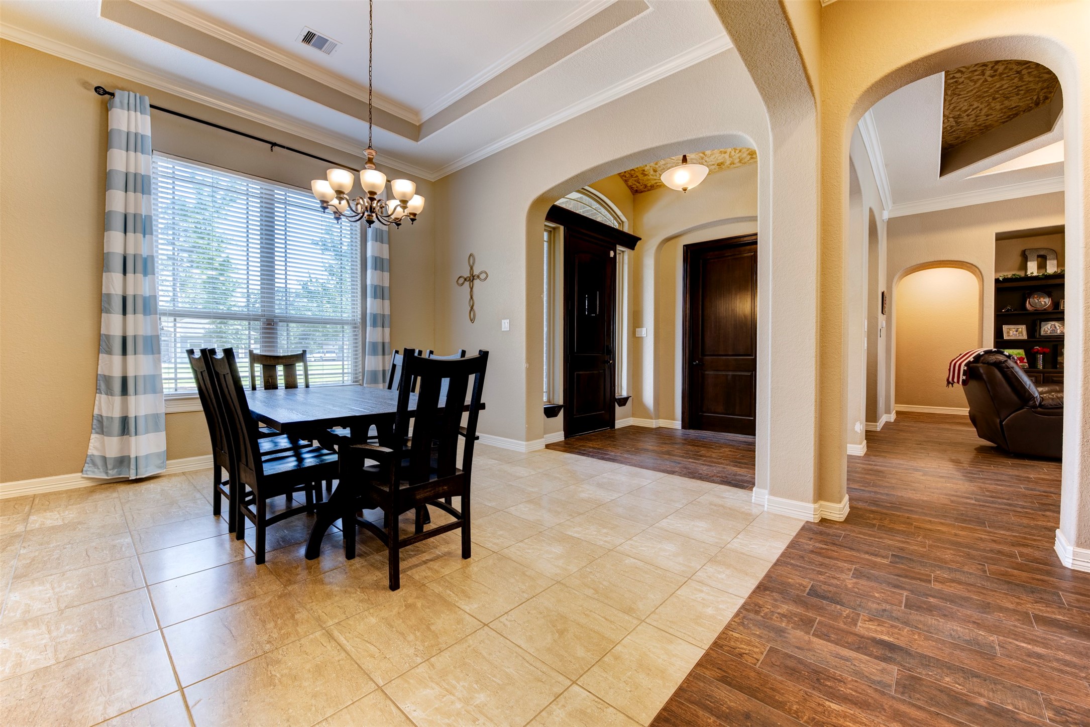 27635 Rio Blanco Drive Splendora, TX 77372 - Photo 5 of 46 a view of a dining room with furniture and a chandelier