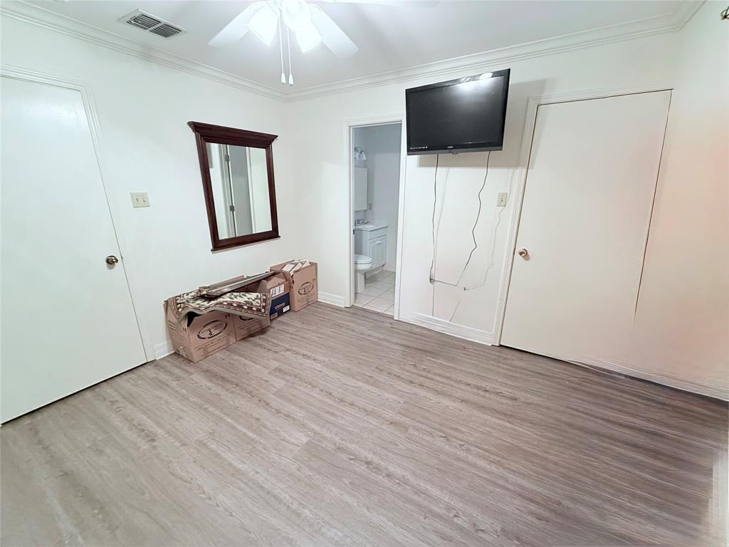 561 Wells Road Haughton, LA 71037 - Photo 13 of 21 a room with a flat screen tv and a couch