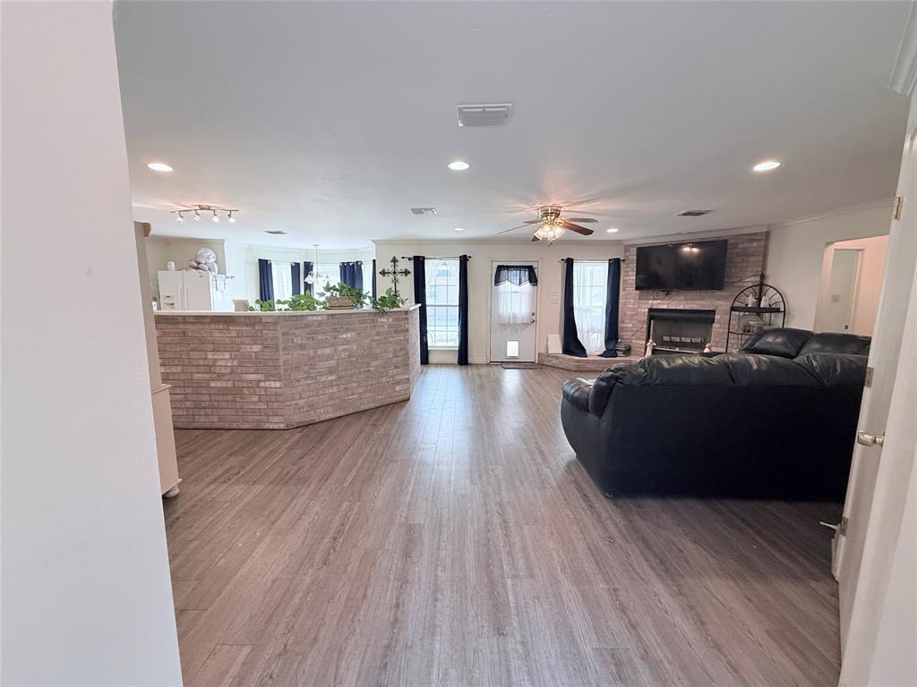 561 Wells Road Haughton, LA 71037 - Photo 4 of 21 a living room with furniture and a wooden floor