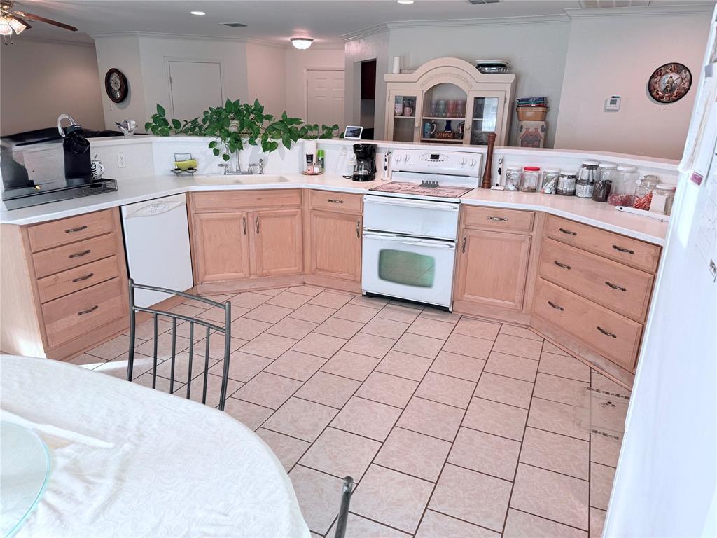 561 Wells Road Haughton, LA 71037 - Photo 5 of 21 a kitchen with a sink and cabinets