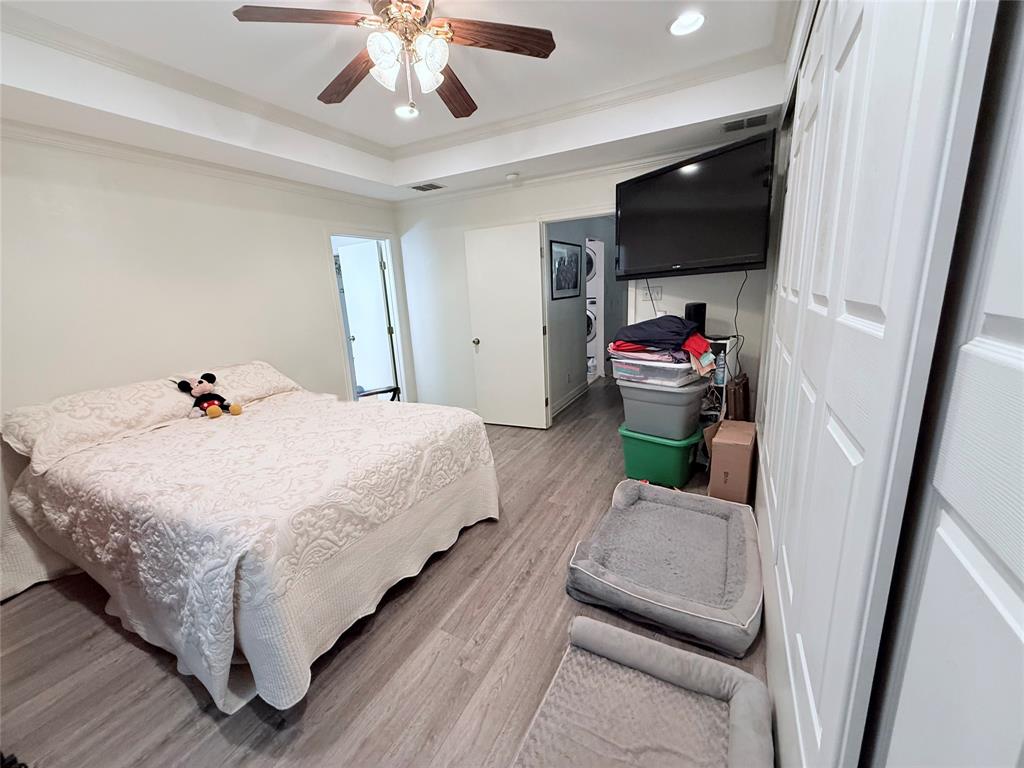 561 Wells Road Haughton, LA 71037 - Photo 7 of 21 a bedroom with a bed and a flat screen tv