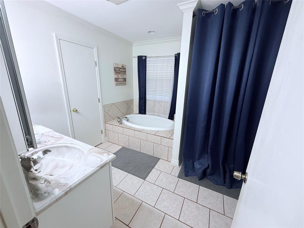 561 Wells Road Haughton, LA 71037 - Photo 9 of 21 a bathroom with a sink and toilet