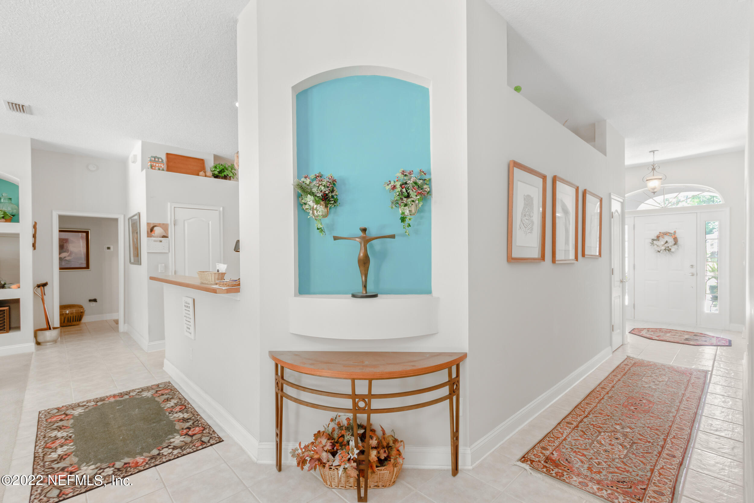 1304 Paradise Pond Road St. Augustine, FL 32092 - Photo 17 of 48 a view of an entryway with wooden floor