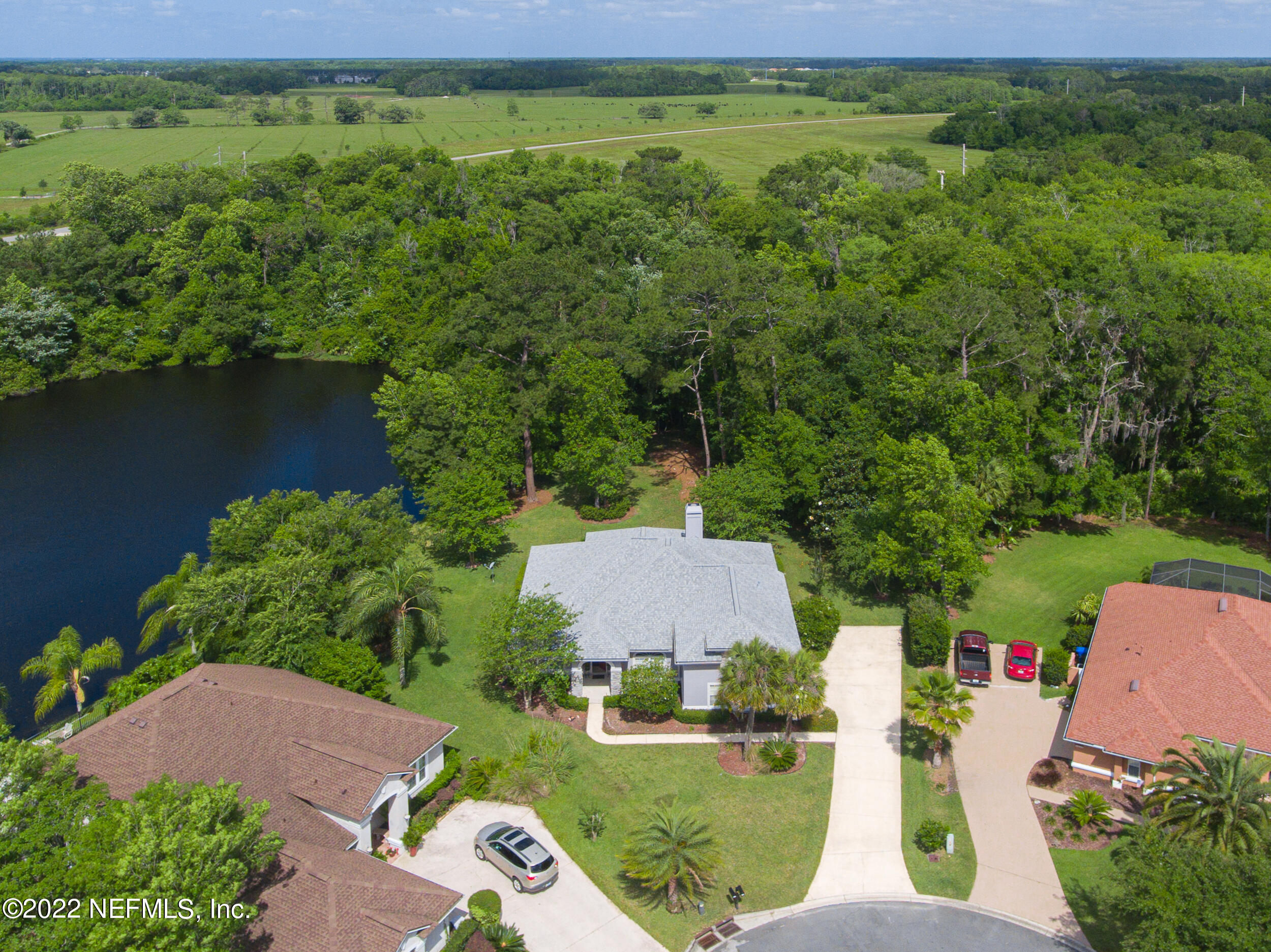 1304 Paradise Pond Road St. Augustine, FL 32092 - Photo 2 of 48 with aerial view of a house with garden space and street view