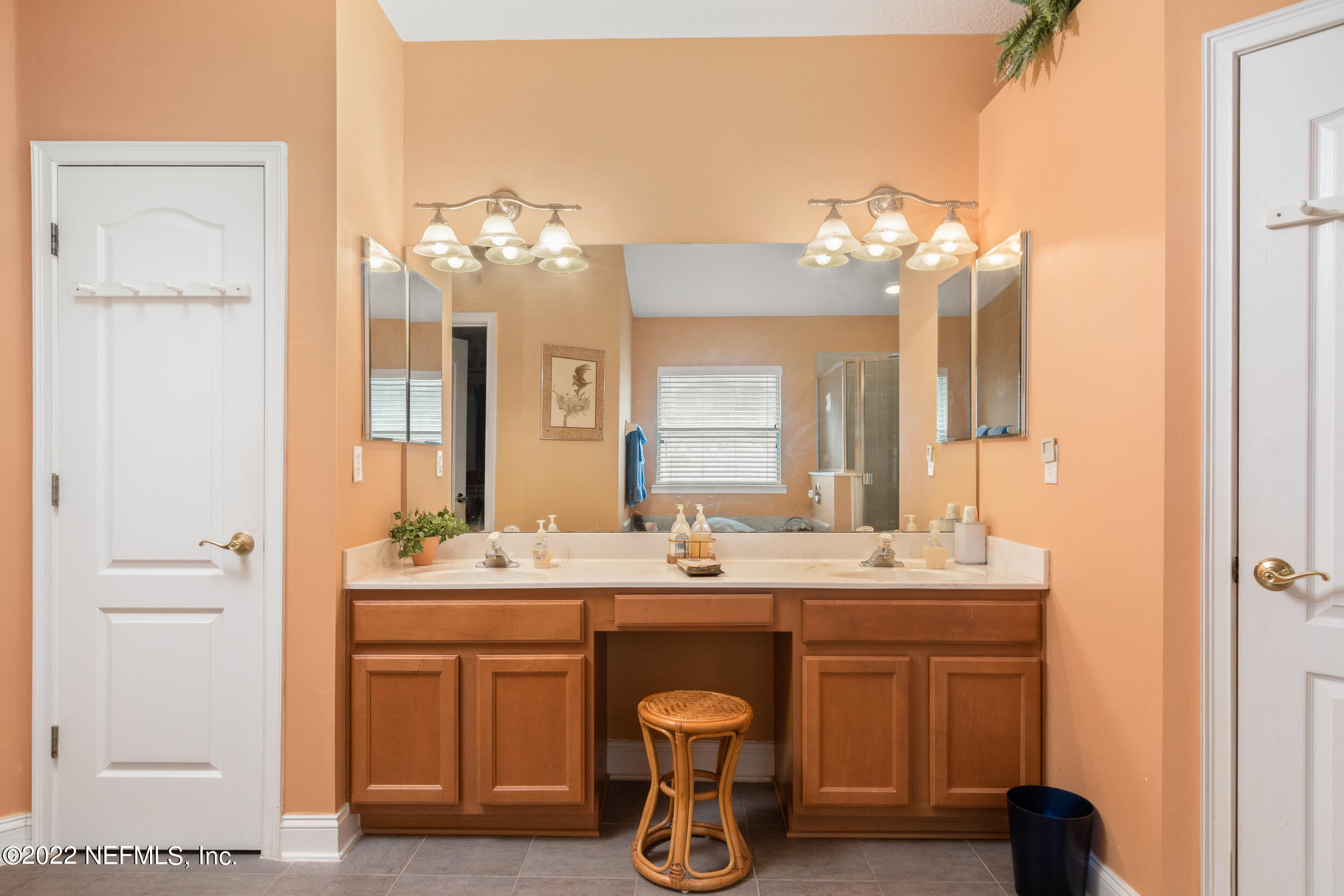 1304 Paradise Pond Road St. Augustine, FL 32092 - Photo 27 of 48 a bathroom with a double vanity sink mirror and