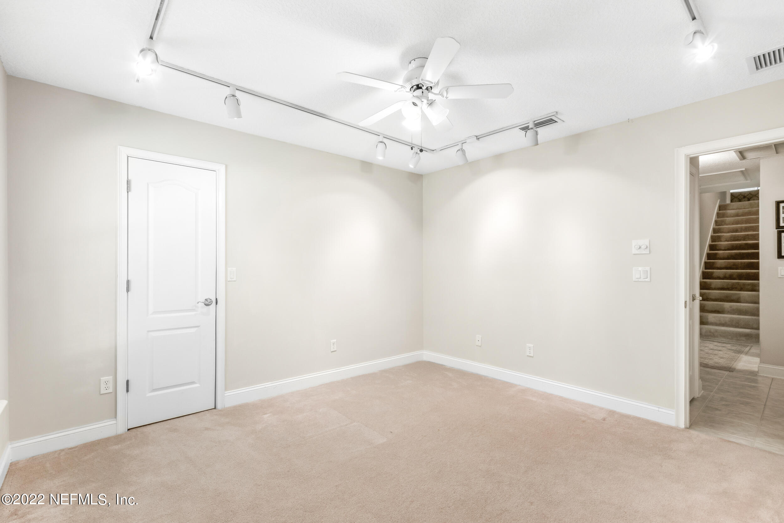 1304 Paradise Pond Road St. Augustine, FL 32092 - Photo 35 of 48 wooden floor in an empty room with a window