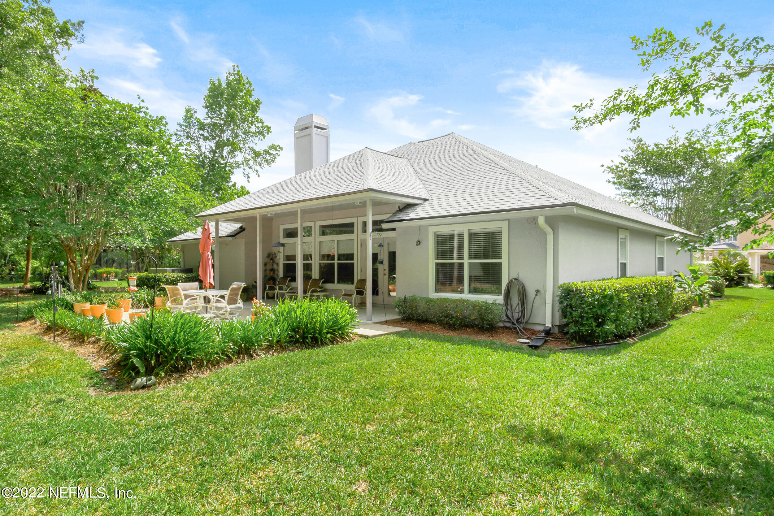 1304 Paradise Pond Road St. Augustine, FL 32092 - Photo 40 of 48 a view of a house with a backyard