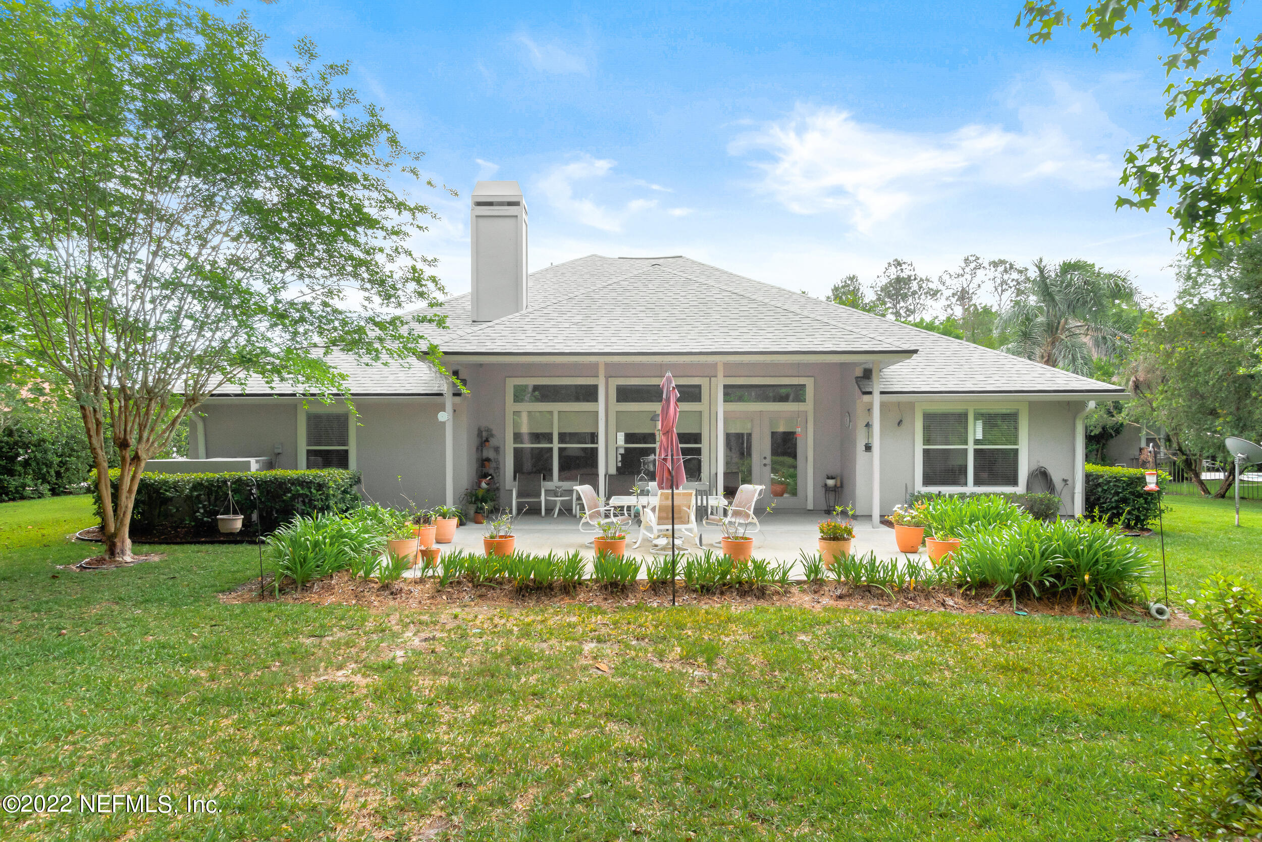 1304 Paradise Pond Road St. Augustine, FL 32092 - Photo 43 of 48 a front view of house with yard and green space