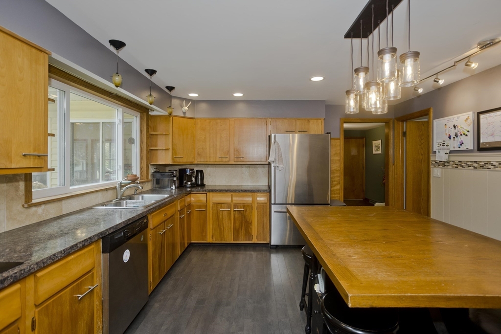 58 Longfellow Road Holyoke, MA 01040 - Photo 17 of 39 a large kitchen with kitchen island a large island in it