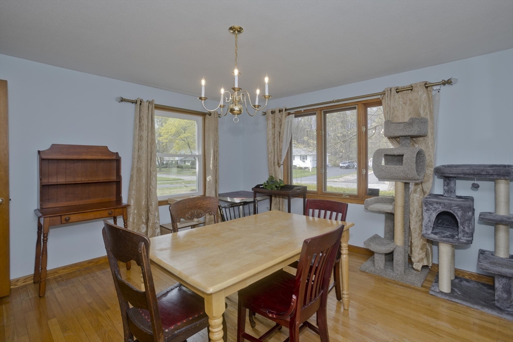 58 Longfellow Road Holyoke, MA 01040 - Photo 21 of 39 a view of a dining room with furniture window and wooden floor