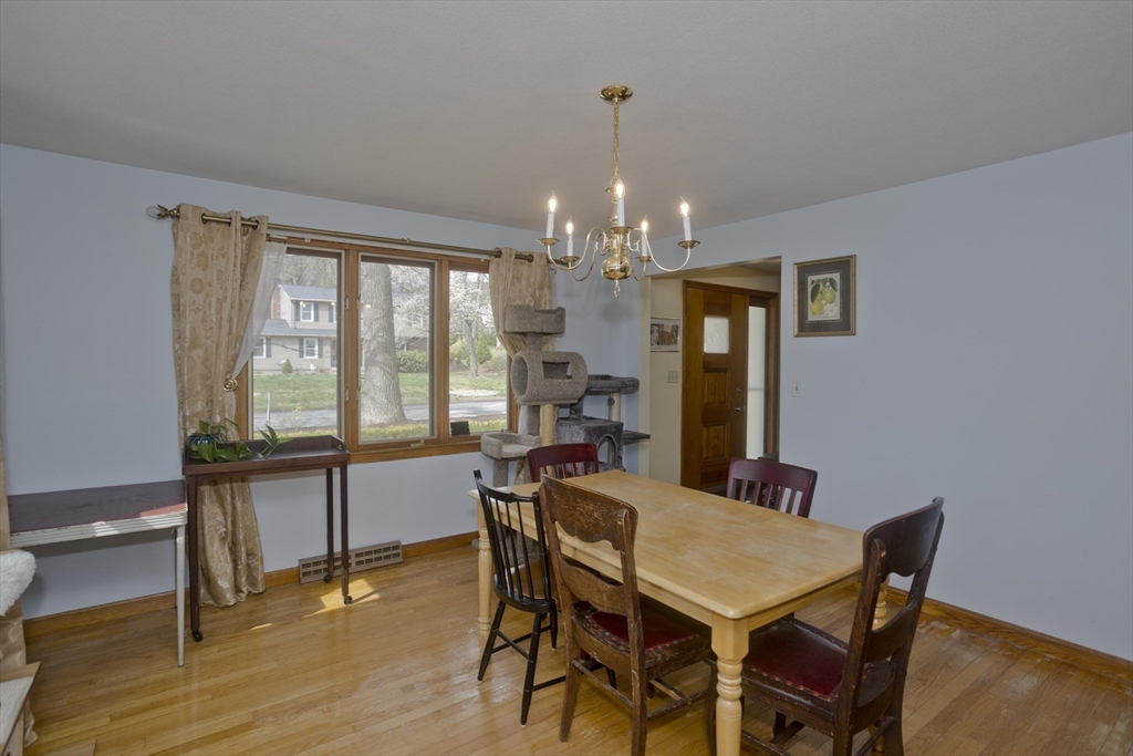 58 Longfellow Road Holyoke, MA 01040 - Photo 22 of 39 a view of a dining room with furniture window and wooden floor