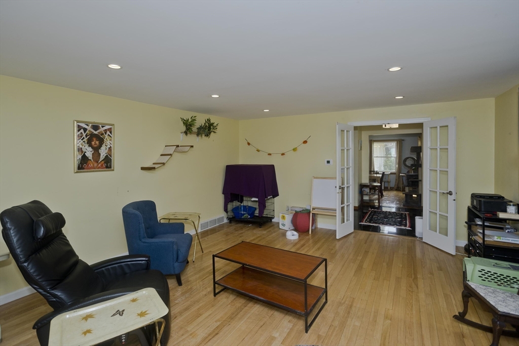 58 Longfellow Road Holyoke, MA 01040 - Photo 25 of 39 a living room with furniture and a flat screen tv