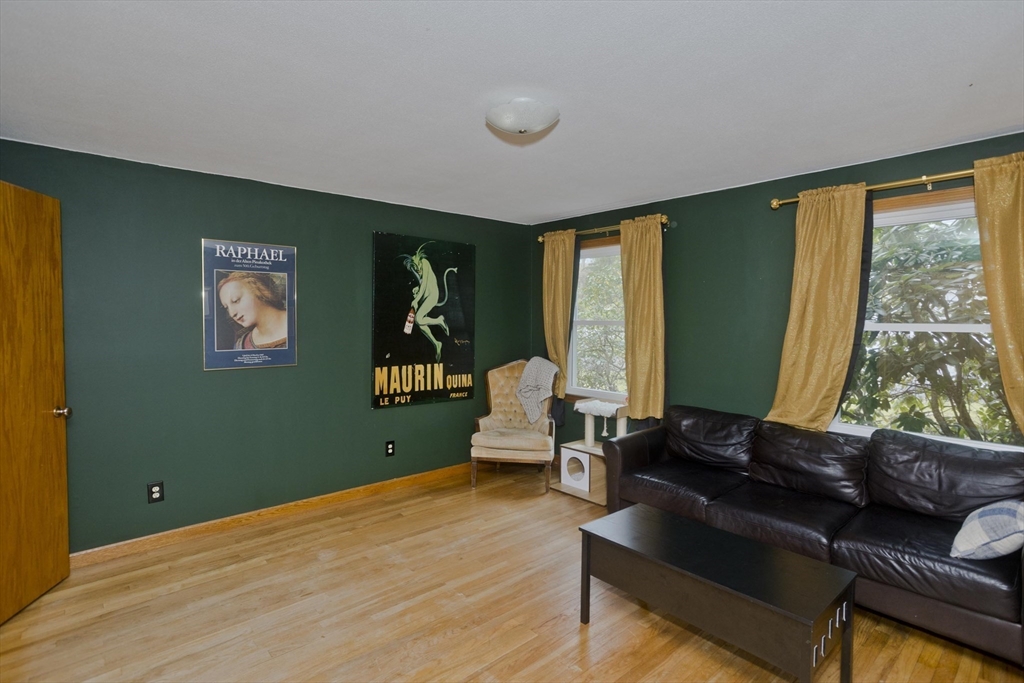 58 Longfellow Road Holyoke, MA 01040 - Photo 27 of 39 a living room with furniture and a large window