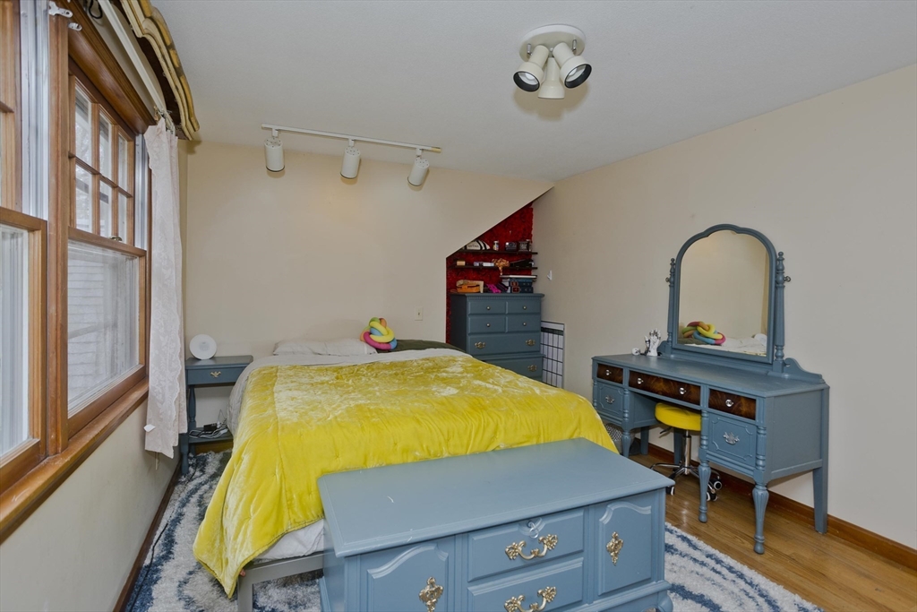 58 Longfellow Road Holyoke, MA 01040 - Photo 34 of 39 a room with table chairs and wooden floor