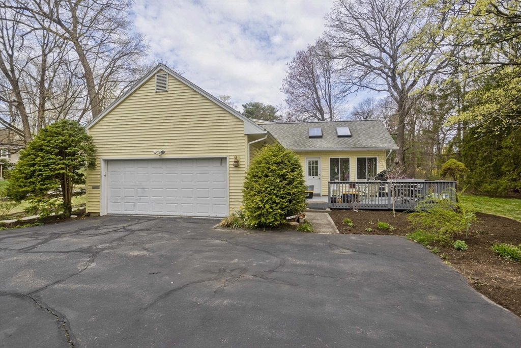 58 Longfellow Road Holyoke, MA 01040 - Photo 4 of 39 a view of a house with a yard and garage