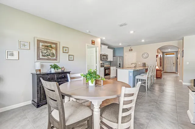 a room with gym equipment and a large window