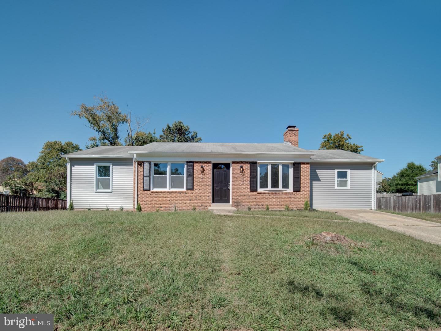 3812 Blackwater Road Clinton, MD 20735 - Photo 2 of 40 a front view of a house with a yard