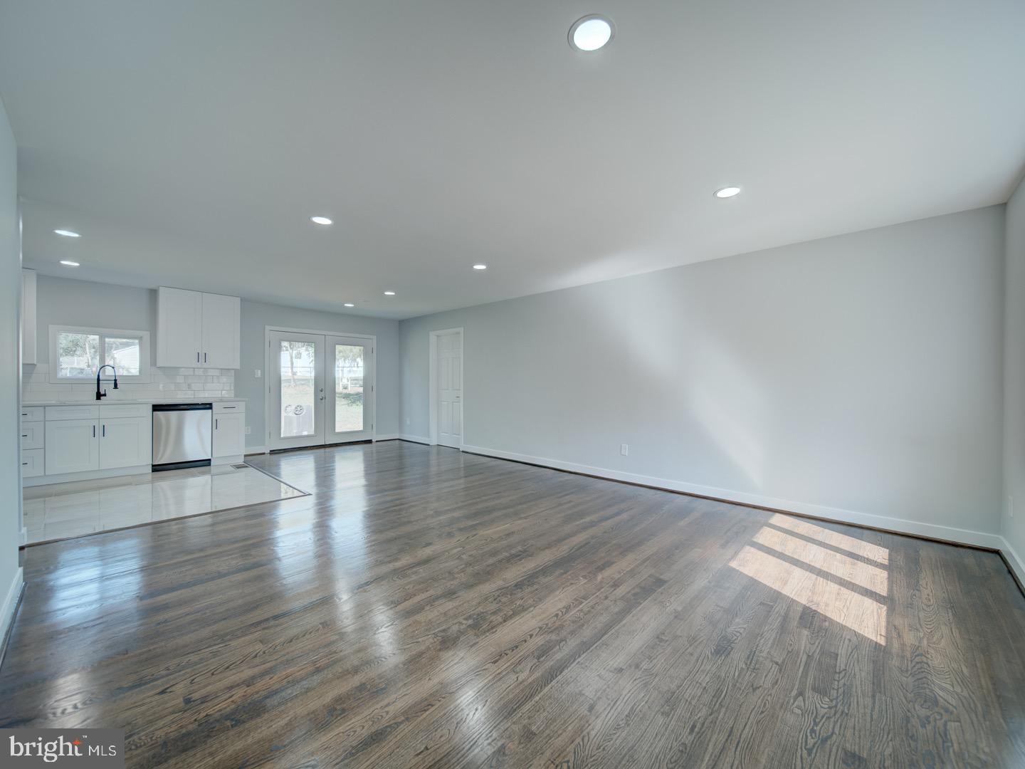 3812 Blackwater Road Clinton, MD 20735 - Photo 8 of 40 a view of empty room with wooden floor