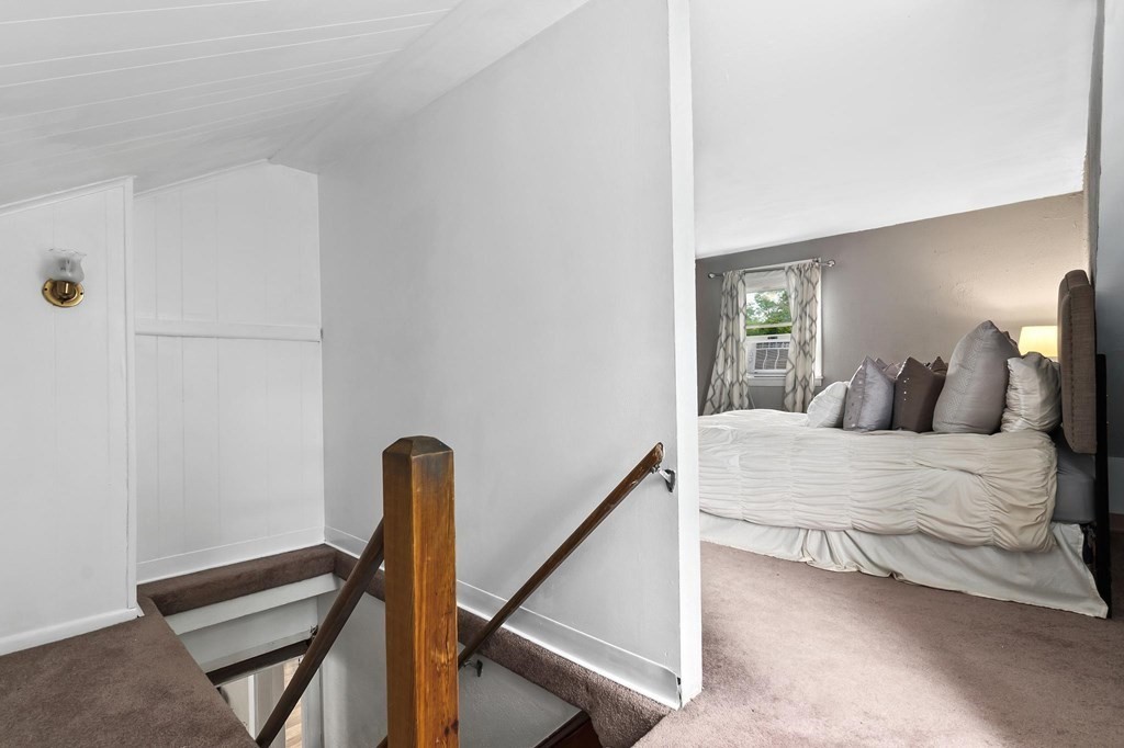 17 Columbia Road Danvers, MA 01923 - Photo 22 of 39 a bedroom with a bed and a window