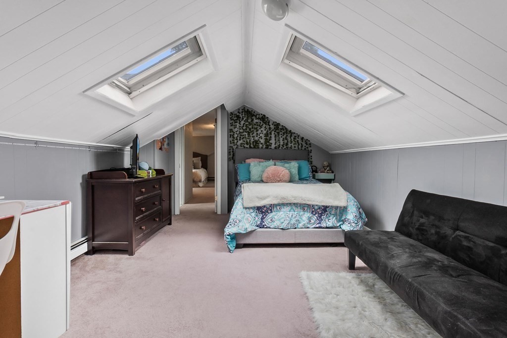 17 Columbia Road Danvers, MA 01923 - Photo 27 of 39 a spacious bedroom with a bed and ceiling fan