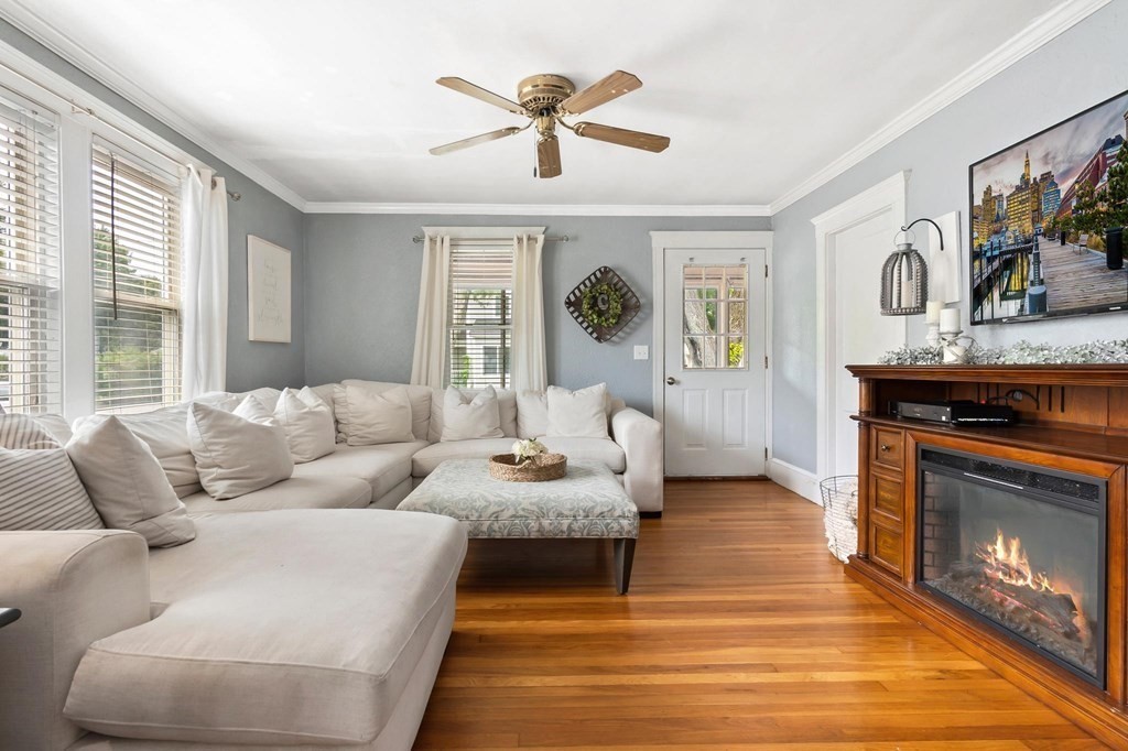 17 Columbia Road Danvers, MA 01923 - Photo 4 of 39 a living room with furniture and a fireplace