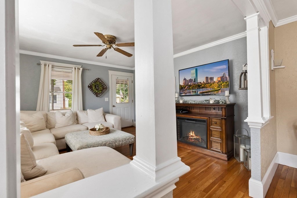 17 Columbia Road Danvers, MA 01923 - Photo 5 of 39 a living room with furniture and a fireplace