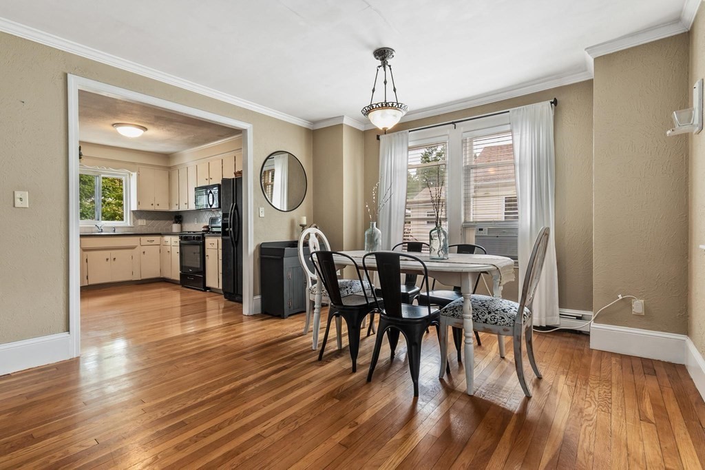 17 Columbia Road Danvers, MA 01923 - Photo 9 of 39 a view of a dining room with furniture window and wooden floor