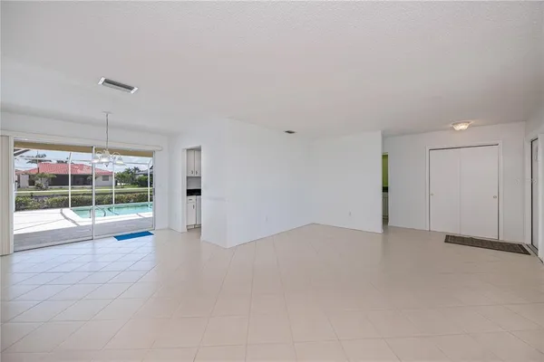 a view of an empty room with a sliding door