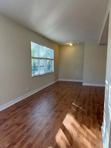 a bathroom with a sink toilet and a mirror
