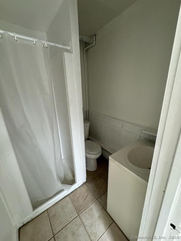 229 Helen Street Bridgeport, CT 06608 - Photo 6 of 6 a bathroom with a sink and a toilet