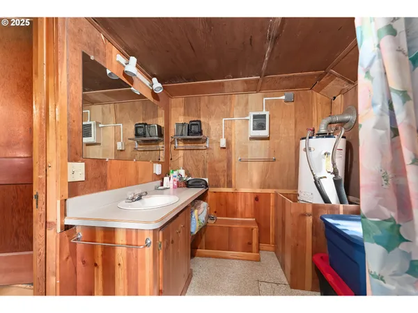 a bedroom with bed and a window