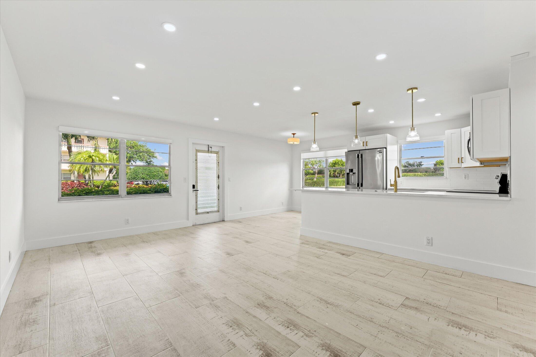 308 Preston H, Unit 308 Boca Raton, FL 33434 - Photo 10 of 22 a view of kitchen and window