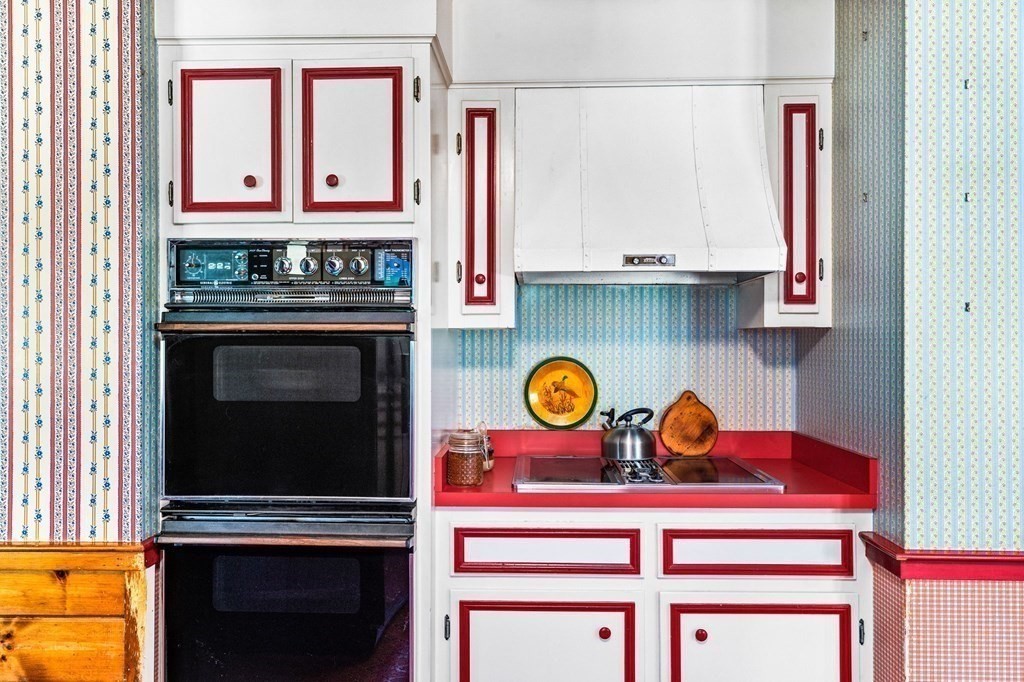 387 County Road Marion, MA 02738 - Photo 5 of 25 a kitchen with a stove and a microwave