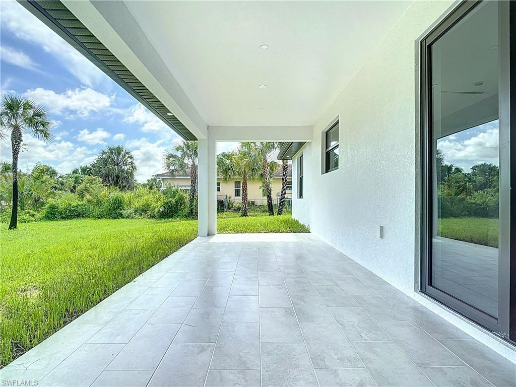2707 36th Avenue Southeast Naples, FL 34117 - Photo 45 of 50 View of patio