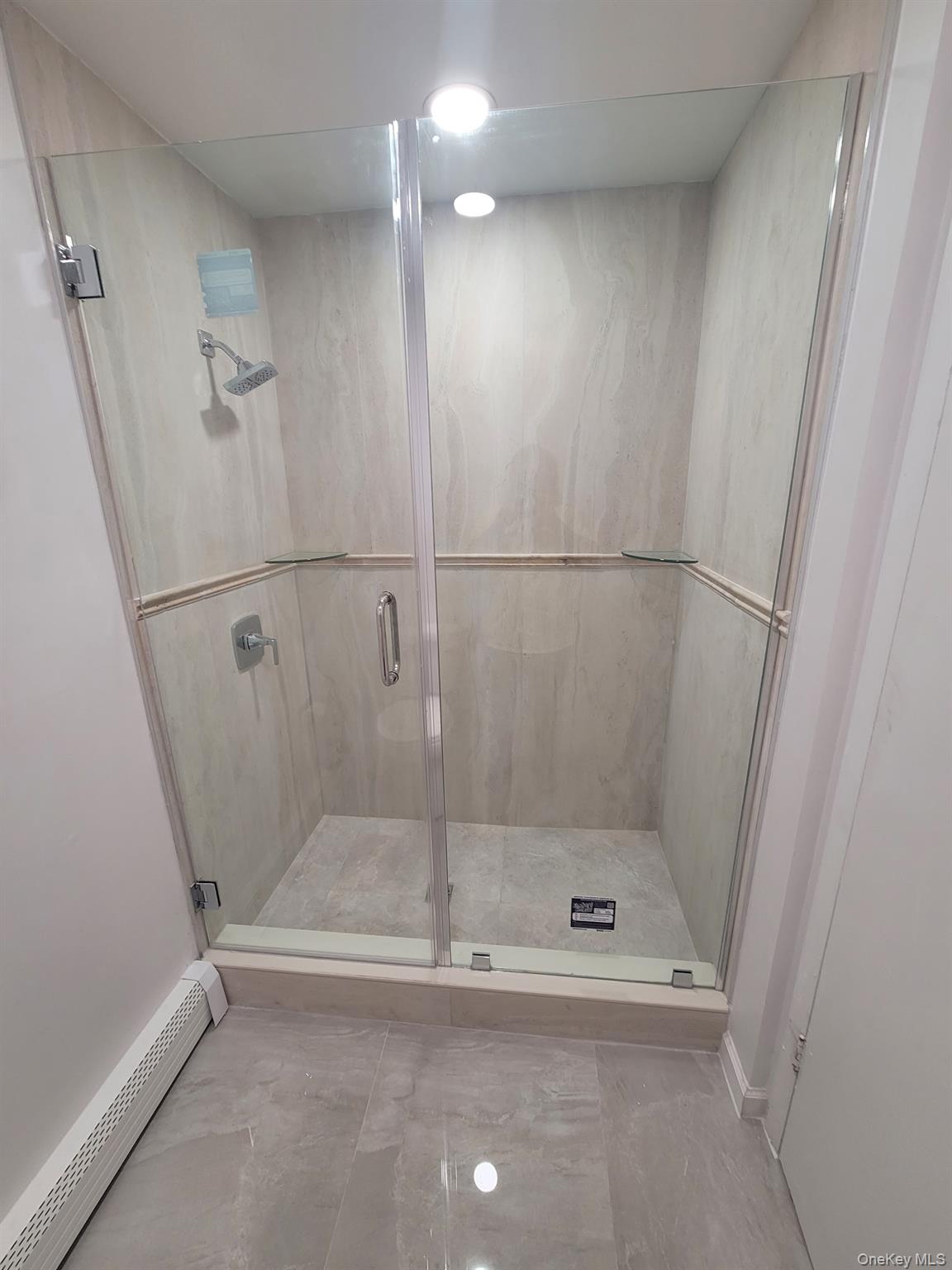 75 Greenway Close, Unit 75 Rye Brook, NY 10573 - Photo 22 of 36 Primary bath shower