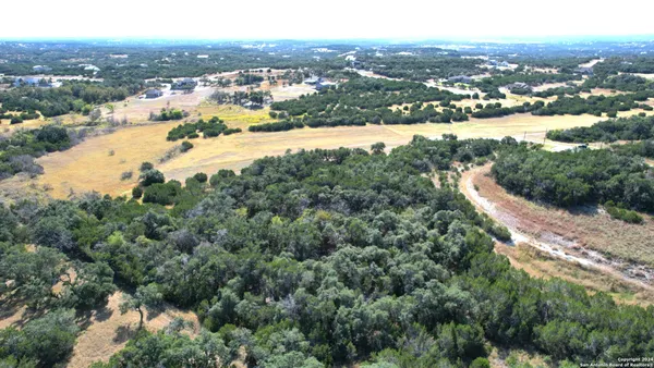 a view of a city with mountains in the background