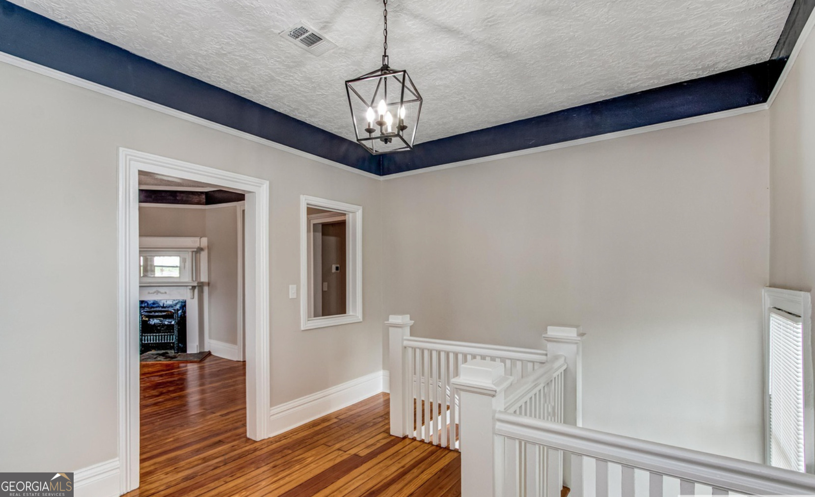 136 Broad Street Augusta, GA 30901 - Photo 5 of 8 a view of entryway with wooden floor