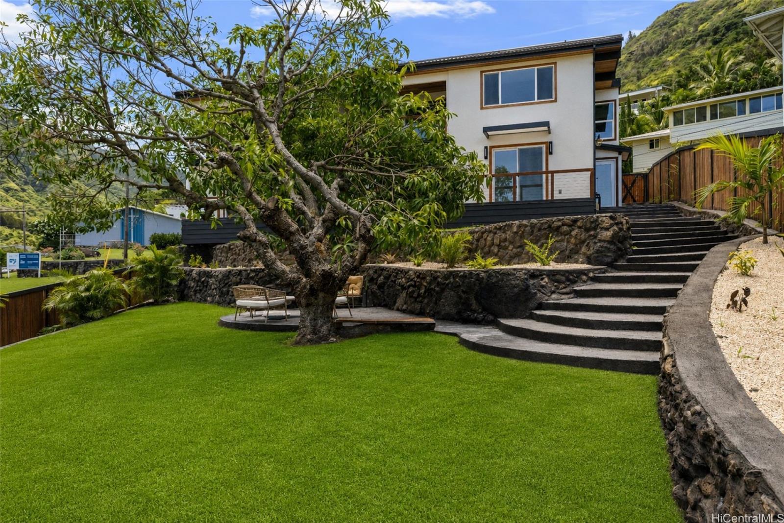 852 Kainoa Place Honolulu, HI 96821 - Photo 21 of 25 a view of a house with backyard and garden