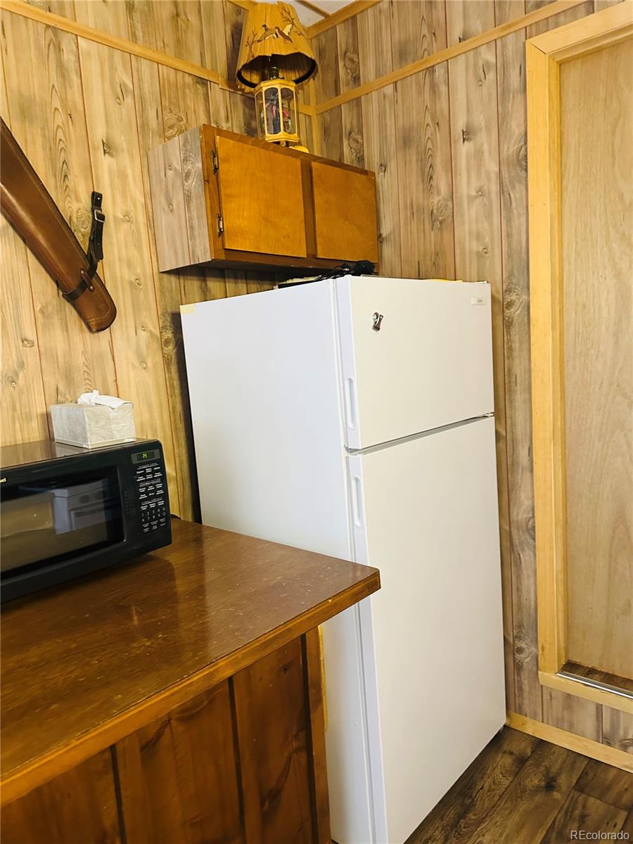 0 County Road La Jara, CO 81140 - Photo 13 of 26 a view of a refrigerator in a kitchen